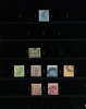 Samling 1855-2001 (blad till 2004) i sju fina, vinröda SAFE-DUAL-album. 