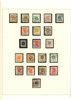 Samling 1855-2001 (blad till 2004) i sju fina, vinröda SAFE-DUAL-album. 