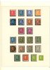 Samling 1855-2001 (blad till 2004) i sju fina, vinröda SAFE-DUAL-album. 