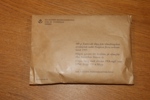 Plomberad förpackning 100 gram klipp från inbetalningskort (postgirot) från PFA, stämplade 1925. Se bild.