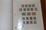 Samling mest ostämplat i SAFE DUAL-album. Flera bättre märken och serier och två brev med halverade 4 cents. Ett fåtal märken i början utan gummi. Även två sidor Slesvig.