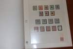 Samling mest ostämplat i SAFE DUAL-album. Flera bättre märken och serier och två brev med halverade 4 cents. Ett fåtal märken i början utan gummi. Även två sidor Slesvig.