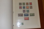 Samling mest ostämplat i SAFE DUAL-album. Flera bättre märken och serier och två brev med halverade 4 cents. Ett fåtal märken i början utan gummi. Även två sidor Slesvig.