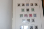 CYPERN. Välfylld samling x/xx 1880-1987 samt turkiska Cypern 1974-87. Sitter i ett LT-album med fickor, där också ett extra album Turkiska Cypern medföljer.