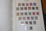 CYPERN. Välfylld samling x/xx 1880-1987 samt turkiska Cypern 1974-87. Sitter i ett LT-album med fickor, där också ett extra album Turkiska Cypern medföljer.