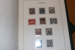 CYPERN. Välfylld samling x/xx 1880-1987 samt turkiska Cypern 1974-87. Sitter i ett LT-album med fickor, där också ett extra album Turkiska Cypern medföljer.