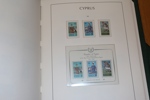 CYPERN. Välfylld samling x/xx 1880-1987 samt turkiska Cypern 1974-87. Sitter i ett LT-album med fickor, där också ett extra album Turkiska Cypern medföljer.