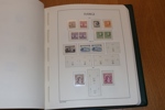 Leuchtturmalbum med fickor 1855-1969. Med en grundsamling xx 1940-69, några luckor i början men från 1943 nästan komplett. 