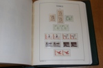 Leuchtturmalbum med fickor 1855-1969. Med en grundsamling xx 1940-69, några luckor i början men från 1943 nästan komplett. 