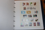 SCHWEIZ + LIECHTENSTEIN. Trevlig grundsamling på blad med egen montering i tjockt album.