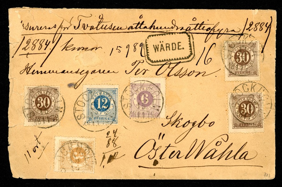 4-färgsfrankerat ass med i allt 111 öres porto sänt från STOCKHOLM C 15.11.1879 till Österwåhla. Bl.a. notering "11 ort" och uträkning av portot.