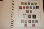 Samling 1866-1992 i två Lindner-album med fickor. Med en del vapentyp, ostämplad serie med "ringar" upp till 1 rubel m.m. Från 1930 nästan komplett och i huvudsak xx, före 1930 mest stämplat.