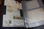 Parti brev och kort i fyra små lådor och ett insticksalbum. Albumet med en del rek, ass, express, lösen m.m. mest från 1900-talets första halva. Bland lådorna även en del vykort.