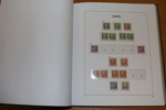 Samling x/xx i DAVO-album med fickor (sidor från 1855). 
