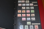 Samling ca 1900-60-tal i album med hemgjord, ngt rörig montering.