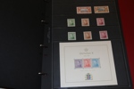 Samling ca 1900-60-tal i album med hemgjord, ngt rörig montering.