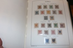 Synnerligen välfylld samling ostämplat/postfriskt 1855-1969 i Leuchtturmalbum med fickor.
