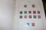 Synnerligen välfylld samling ostämplat/postfriskt 1855-1969 i Leuchtturmalbum med fickor.