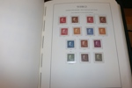 Synnerligen välfylld samling ostämplat/postfriskt 1855-1969 i Leuchtturmalbum med fickor.