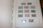 Synnerligen välfylld samling ostämplat/postfriskt 1855-1969 i Leuchtturmalbum med fickor.