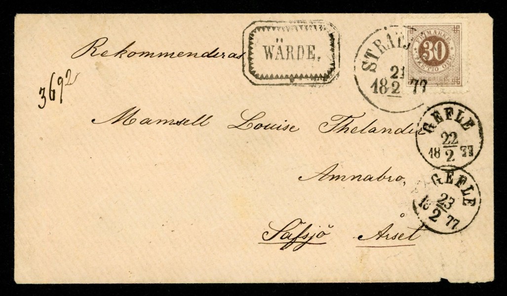 Rekommenderat brev med 30 öre ringtyp t14, stpl STRÅTJÄRA 21.2.1877 och WÄRDE i ram, samt transit GEFLE två datum. Vackert men med en def hörntand och kuvertets baksida med större pappersförlust.
