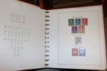 Mindre flyttlåda med bl.a. en Danmark-samling i Stenderalbum inkl bättre, samt flera delsamlingar Norden inkl xx i andra album. Även en del årssatser och en bunt äldre FDC Grönland.
